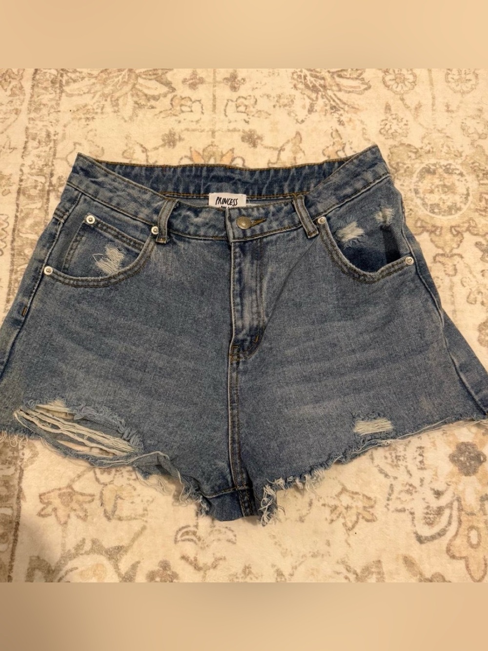 Princess Polly High-Rise Distressed Denim Shorts in Medium Blue